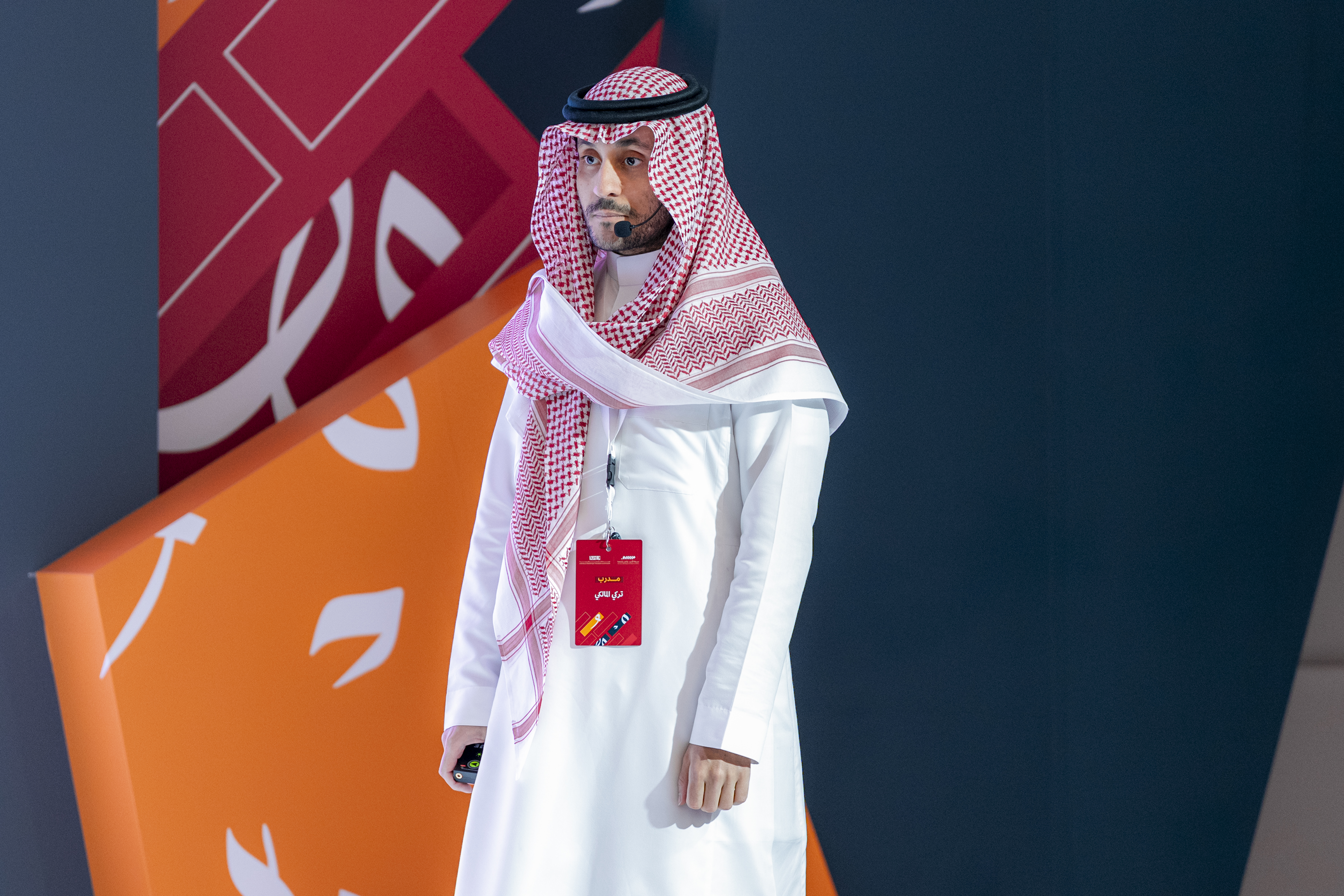 Turki Almalki on stage at an innovation event